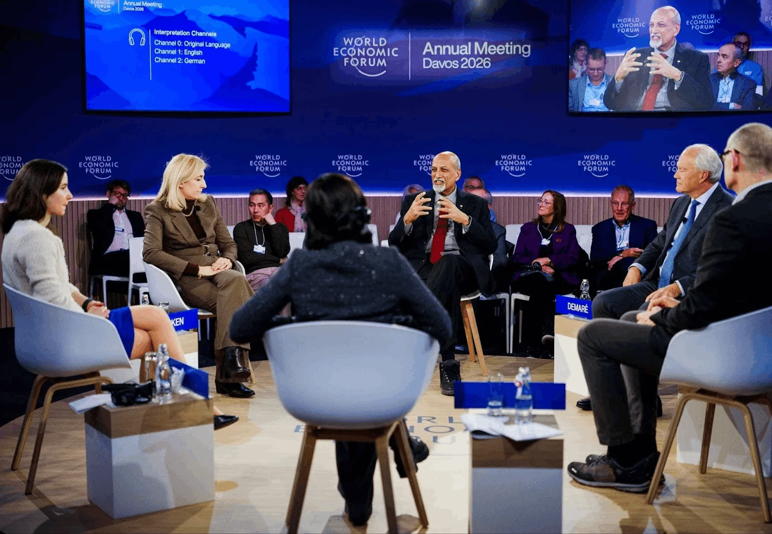 Panel discussion at World Economic Forum Annual Meeting 2026 in Davos, featuring diverse speakers and audience.